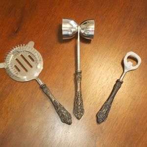 Bartenders mixer set. Shot glass, strainer, bottle